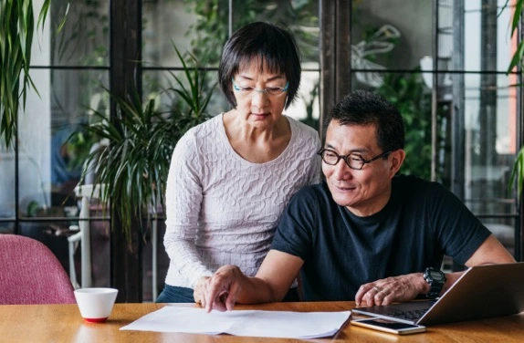 couple looking at papers